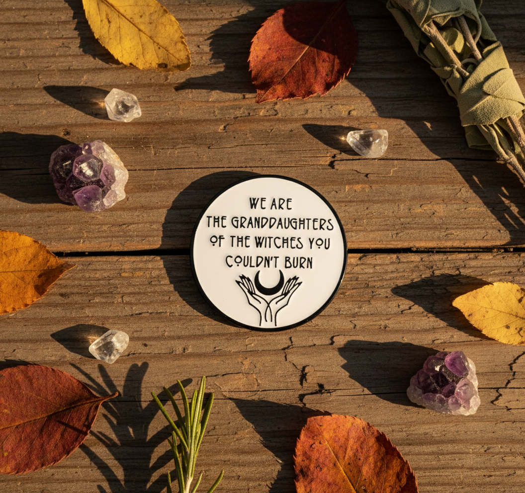 Enamel Pin with quote, autumn leaves, crystals, on wooden surface